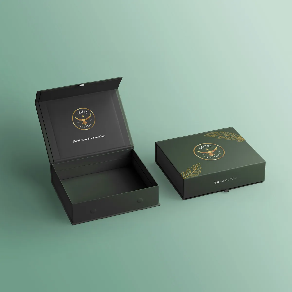 Dark green magnetic closure gift box with a gold foil eagle logo, shown open and closed