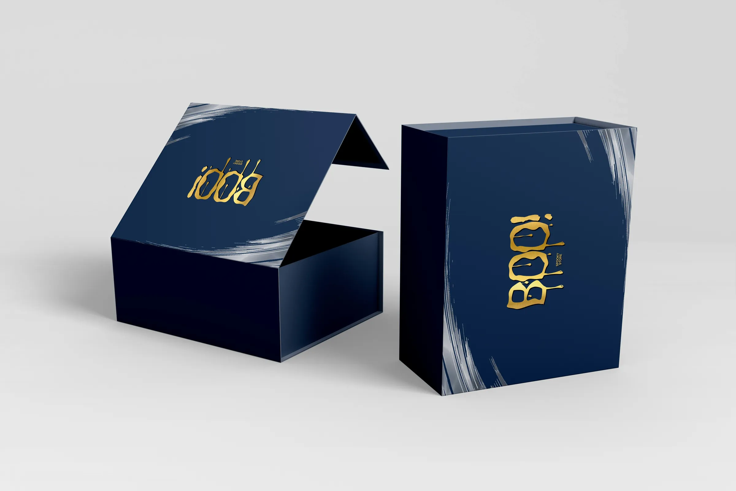 Navy magnetic closure rigid box with a gold foil logo, shown open and closed